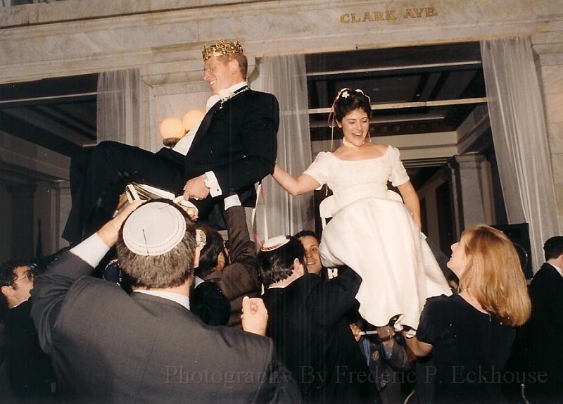 bride and groom on chairs.jpg